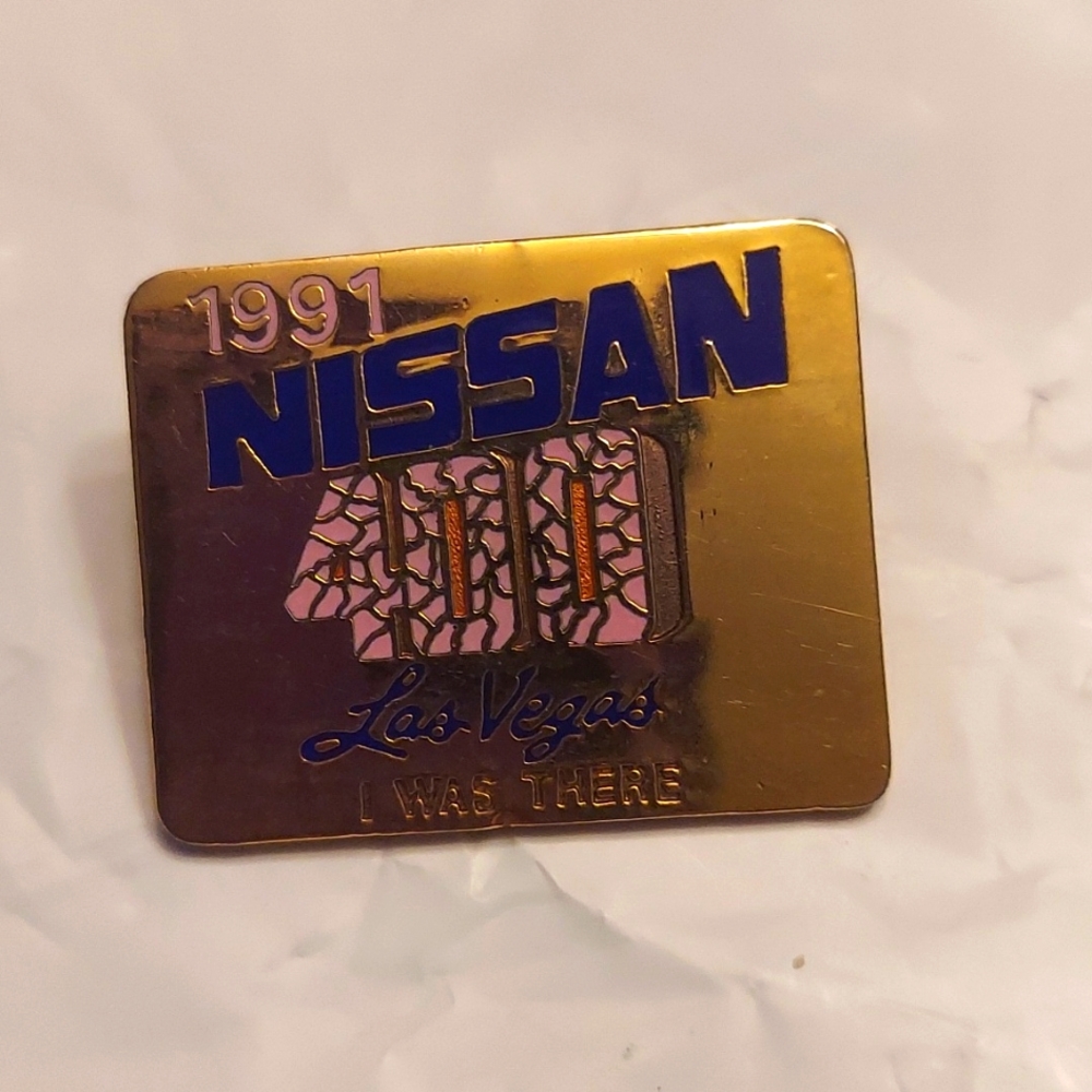 1991 Nissan lapel pin